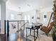 Bright home office features built-in shelving and a large desk at 15680 Panther Lake Dr, Winter Garden, FL 34787