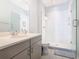 Clean bathroom with a large shower and modern vanity at 15680 Panther Lake Dr, Winter Garden, FL 34787