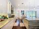 Modern kitchen with island and access to backyard at 15680 Panther Lake Dr, Winter Garden, FL 34787