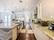Modern kitchen with stainless steel appliances and granite countertops at 15680 Panther Lake Dr, Winter Garden, FL 34787