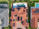 Bird's eye view of a home with solar panels and tile roof at 15680 Panther Lake Dr, Winter Garden, FL 34787