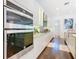 Modern kitchen with double oven and stainless steel appliances at 15680 Panther Lake Dr, Winter Garden, FL 34787