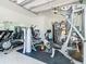 Well-equipped home gym with various exercise machines at 15680 Panther Lake Dr, Winter Garden, FL 34787