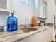 Modern kitchen sink with granite countertop at 15680 Panther Lake Dr, Winter Garden, FL 34787