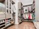 Large walk-in closet with ample shelving and hanging space at 15680 Panther Lake Dr, Winter Garden, FL 34787