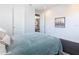 Bedroom with a comfortable bed and access to a hallway at 15680 Panther Lake Dr, Winter Garden, FL 34787