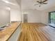 Open concept living room and kitchen with hardwood floors at 232 Riverbend Dr # 201, Altamonte Springs, FL 32714