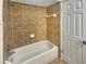 Clean bathroom with tile shower/tub combo at 232 Riverbend Dr # 201, Altamonte Springs, FL 32714