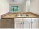 Clean kitchen with stainless steel appliances and granite counters at 232 Riverbend Dr # 201, Altamonte Springs, FL 32714