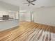 Spacious living area with hardwood floors and kitchen at 232 Riverbend Dr # 201, Altamonte Springs, FL 32714