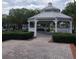 White gazebo with brick pavers at 6682 Time Square Ave # 101, Orlando, FL 32835