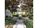Landscaped walkway leading to waterfront dock access at 6682 Time Square Ave # 101, Orlando, FL 32835