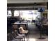 Restaurant patio with seating and ceiling fan at 6682 Time Square Ave # 101, Orlando, FL 32835