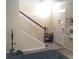 Bright entryway with staircase, storage, and front door at 6682 Time Square Ave # 101, Orlando, FL 32835