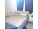 Primary bedroom with king-size bed and neutral decor at 6682 Time Square Ave # 101, Orlando, FL 32835