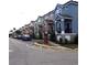 Row of colorful townhouses with parking at 6682 Time Square Ave # 101, Orlando, FL 32835