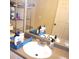 Bathroom with a double vanity and mirror at 6682 Time Square Ave # 101, Orlando, FL 32835