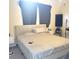 Spacious bedroom with a large bed and neutral decor at 6682 Time Square Ave # 101, Orlando, FL 32835