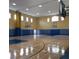 Spacious indoor basketball court with multiple hoops at 6682 Time Square Ave # 101, Orlando, FL 32835