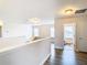 Upper hallway with access to bathroom and bedrooms at 1508 Caterpillar St, St Cloud, FL 34771