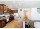 Modern kitchen with granite countertops and stainless steel appliances at 1508 Caterpillar St, St Cloud, FL 34771