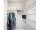 Walk-in closet with wire shelving and plenty of hanging space at 1508 Caterpillar St, St Cloud, FL 34771