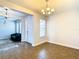 Bright and airy entryway with tile flooring and modern light fixtures at 1508 Caterpillar St, St Cloud, FL 34771