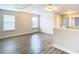 Bonus room with wood-look floors and two windows at 1508 Caterpillar St, St Cloud, FL 34771