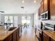 Modern kitchen with granite countertops and stainless steel appliances at 1508 Caterpillar St, St Cloud, FL 34771