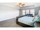 Well-lit bedroom with large windows and a king-size bed at 1508 Caterpillar St, St Cloud, FL 34771