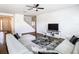 Relaxing living room with sectional sofa and ceiling fan at 1508 Caterpillar St, St Cloud, FL 34771