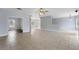 Spacious living room with tile floors and views to other rooms at 2017 W State Road 426, Oviedo, FL 32765