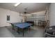 Finished garage with ping pong table and game area at 2588 Shanti Dr, Kissimmee, FL 34746