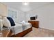 Spacious bedroom with a king-size bed, TV, and plenty of closet space at 2588 Shanti Dr, Kissimmee, FL 34746