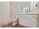Clean and bright bathroom with tub, shower, and vanity at 2588 Shanti Dr, Kissimmee, FL 34746