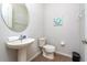 Small bathroom with toilet and sink at 2588 Shanti Dr, Kissimmee, FL 34746