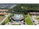 Aerial view of community pool, clubhouse, and surrounding homes at 2588 Shanti Dr, Kissimmee, FL 34746