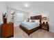 Comfortable bedroom with a king bed and calming decor at 2588 Shanti Dr, Kissimmee, FL 34746