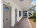 Hallway with two light taupe doors and white walls at 1000 S Orlando Ave # A5, Maitland, FL 32751