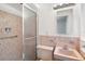 Bathroom with beige tile and a pink vanity at 1000 S Orlando Ave # A5, Maitland, FL 32751