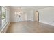 Spacious dining area featuring tile flooring and access to kitchen at 1000 S Orlando Ave # A5, Maitland, FL 32751