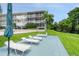 Relaxing pool area with lounge chairs and landscaping at 1000 S Orlando Ave # A5, Maitland, FL 32751