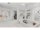 Large bathroom with a luxurious soaking tub and double vanities at 9832 Laurel Valley Dr, Windermere, FL 34786