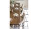 Modern dining room with a long wooden table and sleek chairs at 9832 Laurel Valley Dr, Windermere, FL 34786