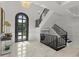 Bright and spacious entryway with marble floors and a grand staircase at 9832 Laurel Valley Dr, Windermere, FL 34786