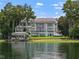 Luxury waterfront home with a private dock and stunning lake views at 9832 Laurel Valley Dr, Windermere, FL 34786