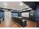 Basement home theater with plush seating and large screen at 9832 Laurel Valley Dr, Windermere, FL 34786