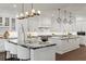 Spacious kitchen with double islands and white cabinetry at 9832 Laurel Valley Dr, Windermere, FL 34786