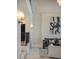 Bright living room with white walls and a large abstract painting at 9832 Laurel Valley Dr, Windermere, FL 34786