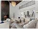 Elegant two-story living room with fireplace and high ceilings at 9832 Laurel Valley Dr, Windermere, FL 34786